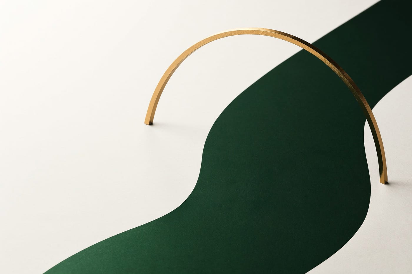 A curving green band like a river with a gold arc bridging it